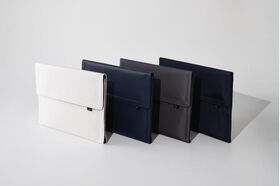 Hands 8. 4-in-1 Protective Magnetic Laptop Sleeve Case with Mouse Mat & Accessory Pouch