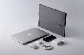 Hands 8. 4-in-1 Protective Magnetic Laptop Sleeve Case with Mouse Mat & Accessory Pouch